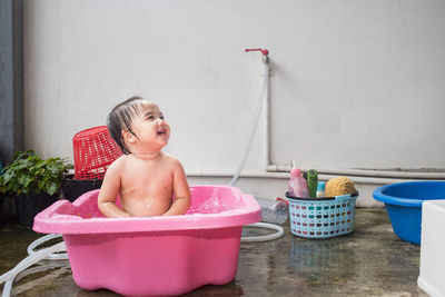 Boy looking at camera at home