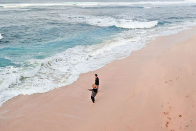 High angle view of woman on beach