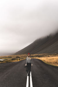 Woman on empty road