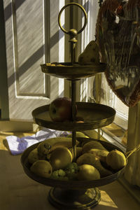 Close-up of fruits hanging on table