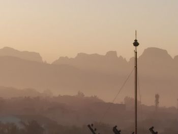 Scenic view of mountains against sky during sunset