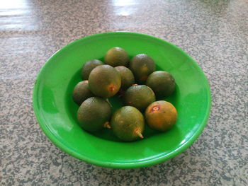 High angle view of fruits in bowl on table