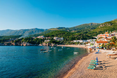 Scenic view of sea against clear blue sky