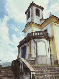 Low angle view of old building against sky