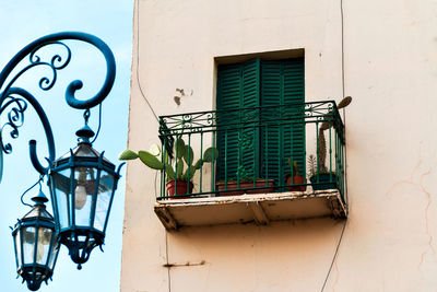 Low angle view of green balcony in building