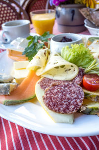 Salami and ham with fresh salad