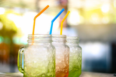 Close-up of cold drinks on table