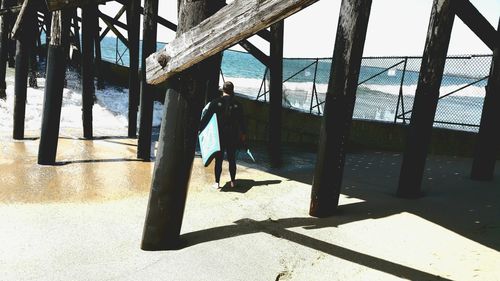 Woman with shadow on floor