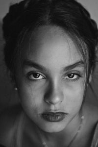 Close-up portrait of confident teenage girl
