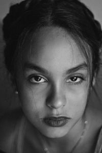Close-up portrait of confident teenage girl