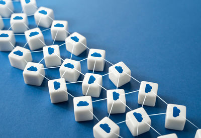 High angle view of toy blocks on blue background