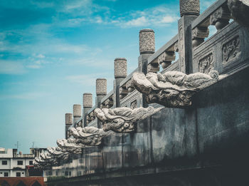 Low angle view of sculptures on building