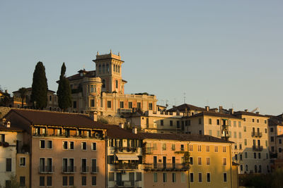 View of buildings against clear sky