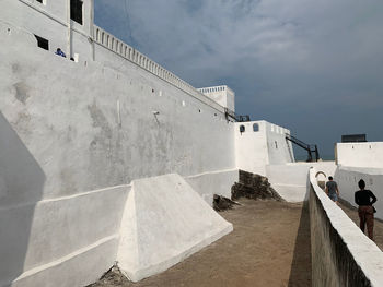 View of building against cloudy sky