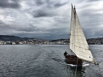 View of calm sea against cloudy sky