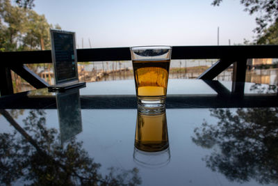 Close-up of beer glass on table