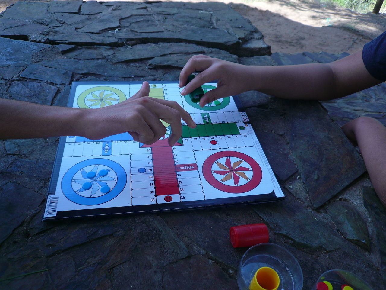 HIGH ANGLE VIEW OF CHILD PLAYING WITH TEXT