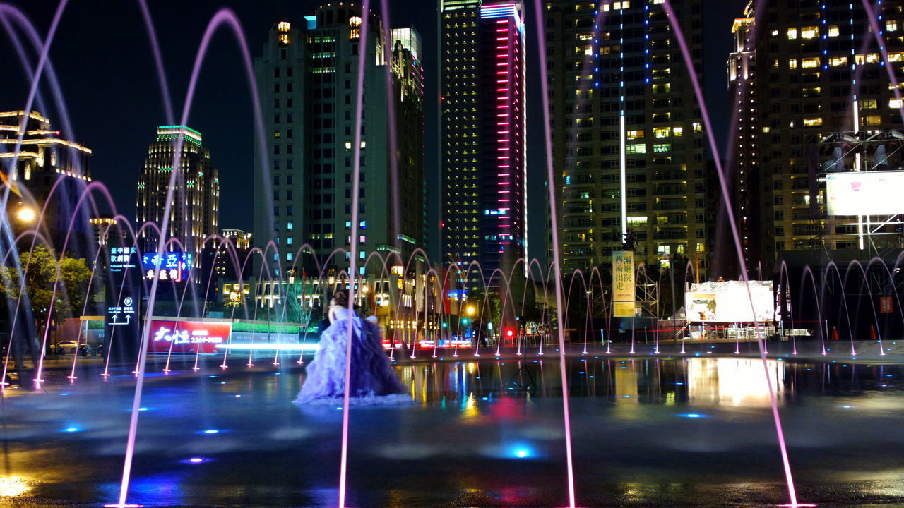 ILLUMINATED BUILDINGS AT NIGHT