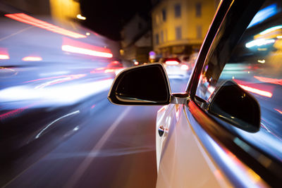 Blurred motion of car on road at night