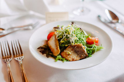 Close-up of food in plate on table