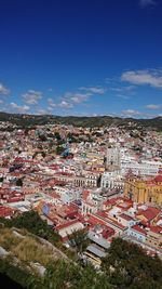 High angle shot of townscape against sky