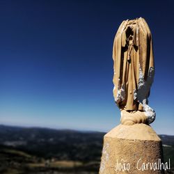 Close-up of statue against clear sky