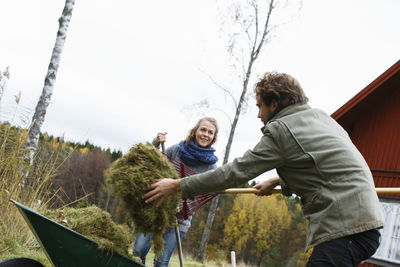 Couple gardening at autumn