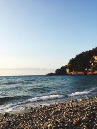Scenic view of sea against clear sky