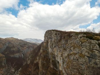 Scenic view of rocky mountains against sky