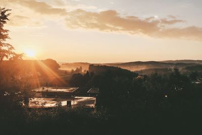 Scenic view of landscape against sky during sunset