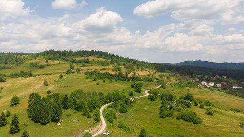 Scenic view of land against sky