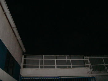 Low angle view of built structure at night