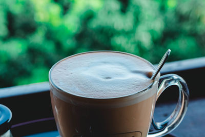 Close-up of coffee cup on table