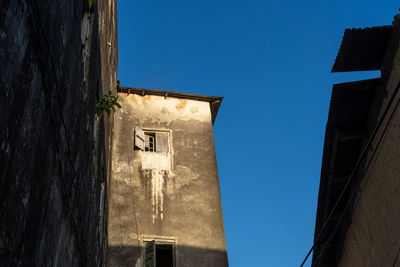 Low angle view of building against clear sky