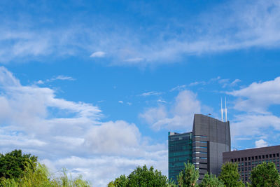 Low angle view of skyscrapers against sky