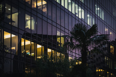 Low angle view of modern building at night