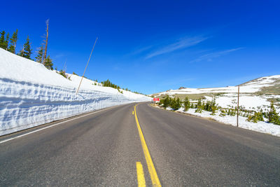 Winter road with blue sky in colorado