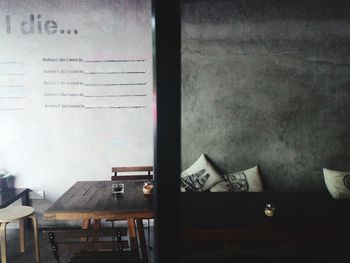 View of open book on table in restaurant