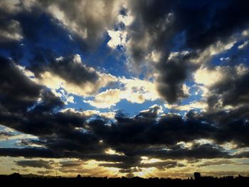 Low angle view of dramatic sky during sunset