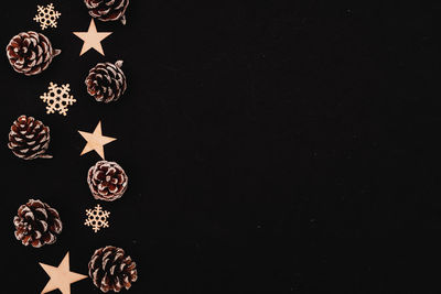 Close-up of christmas decoration against black background