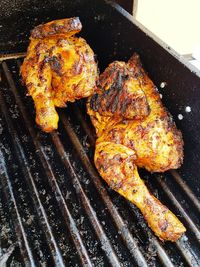 Close-up of meat on barbecue grill