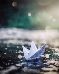 Close-up of paper floating on water