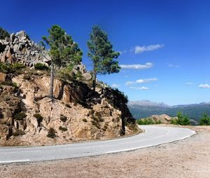 Scenic view of mountains against clear blue sky