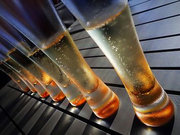 Low angle view of wet glass on table