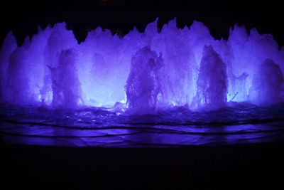 Close-up of sea against sky at night