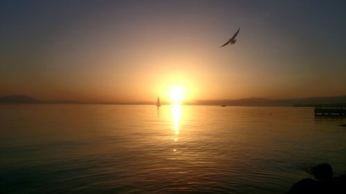 Scenic view of sea against sky during sunset