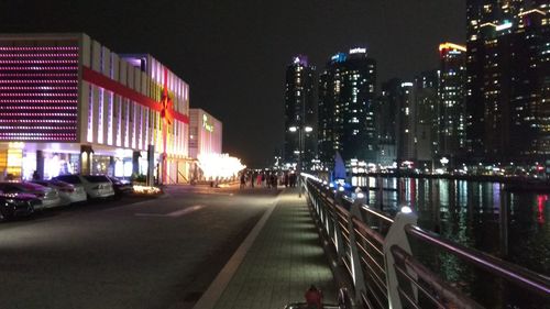 View of city lit up at night