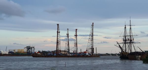 Boats in sea against sky