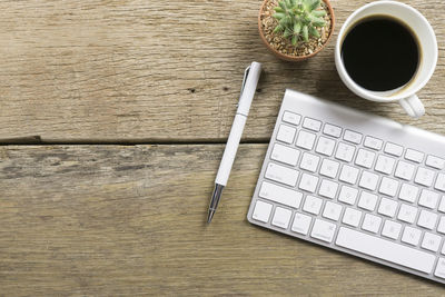 High angle view of coffee cup on table