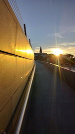 Panoramic view of illuminated city at sunset